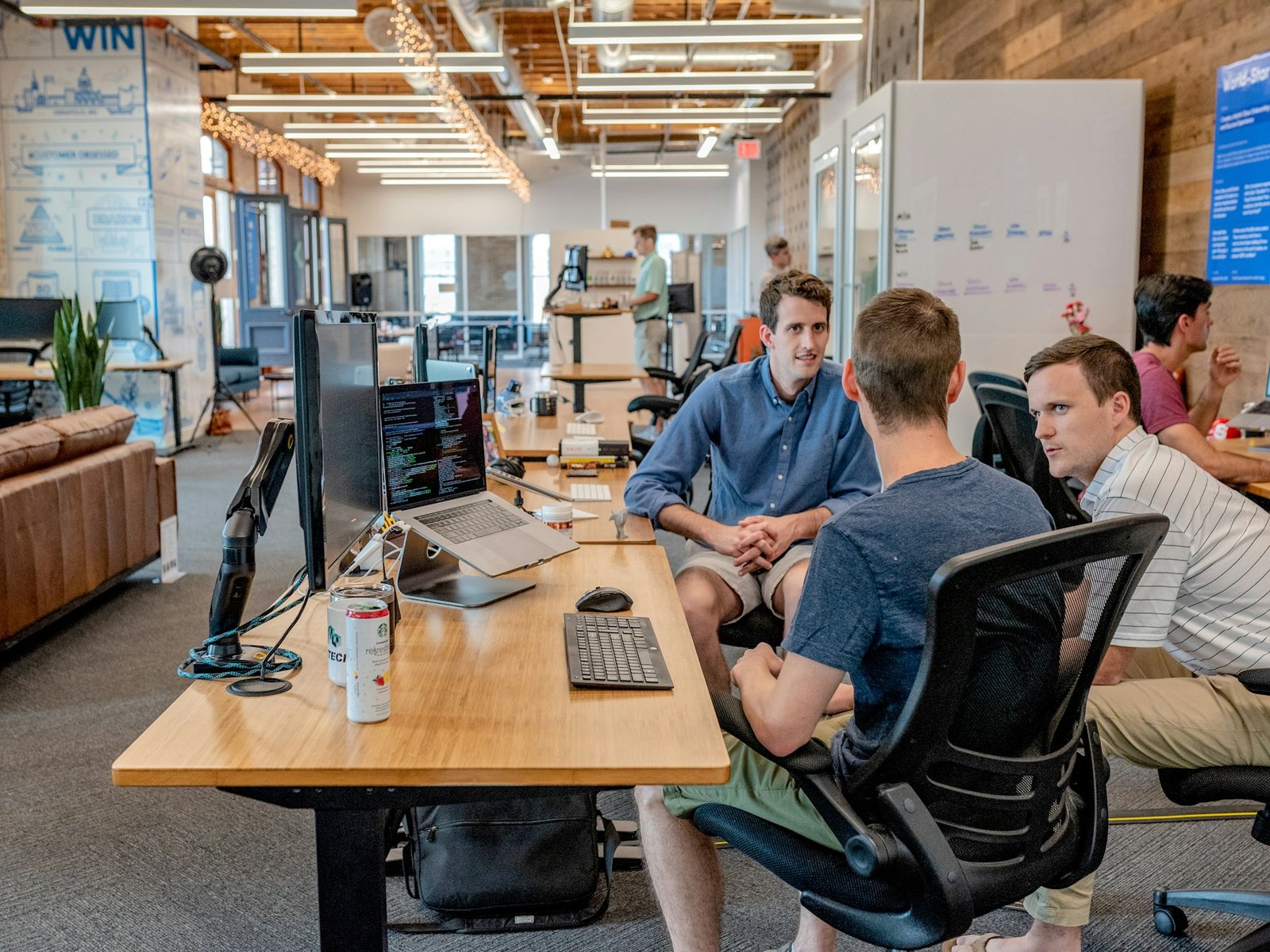 Business owners discussing finance in a modern office